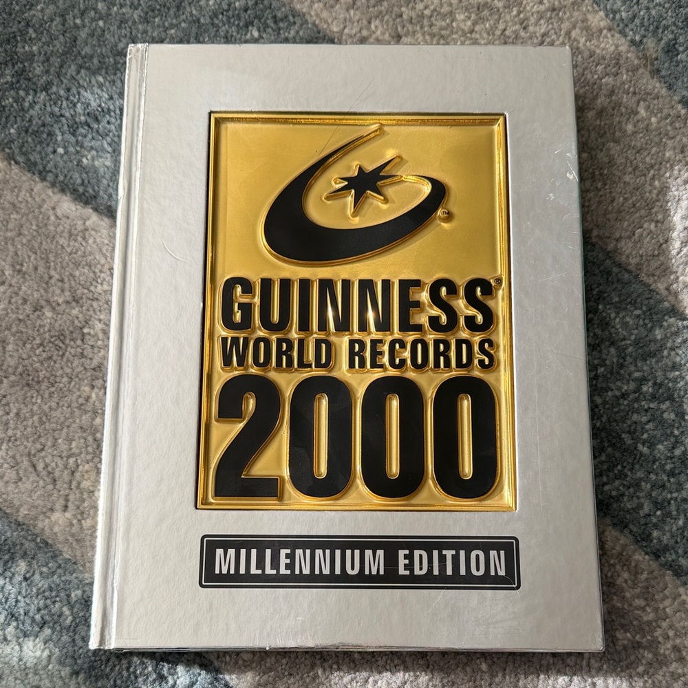 Guinness World Records 2000 Millennium Edition - Gold and Black Cover